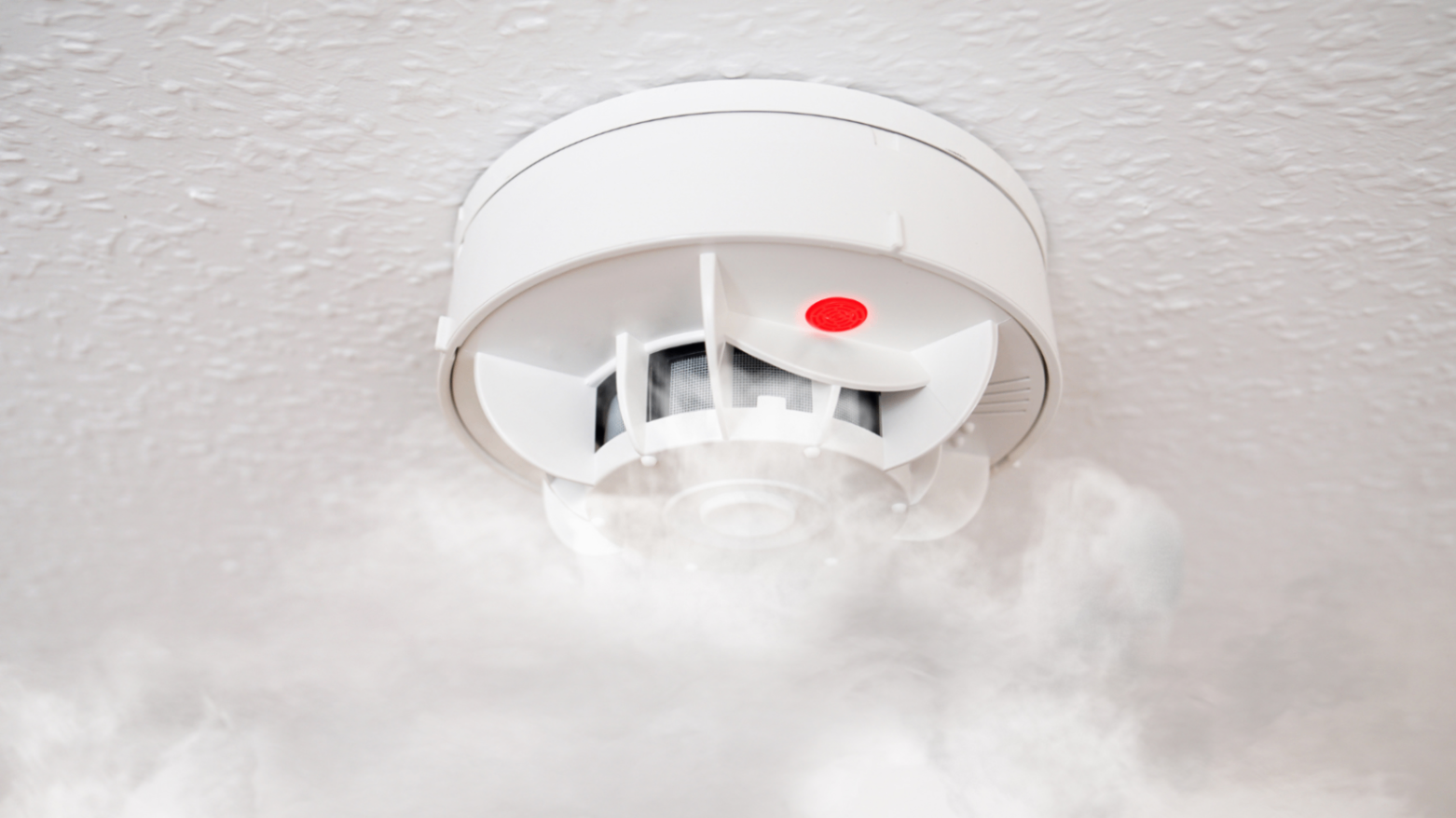 Fire alarm detector installed on a ceiling in Crewe